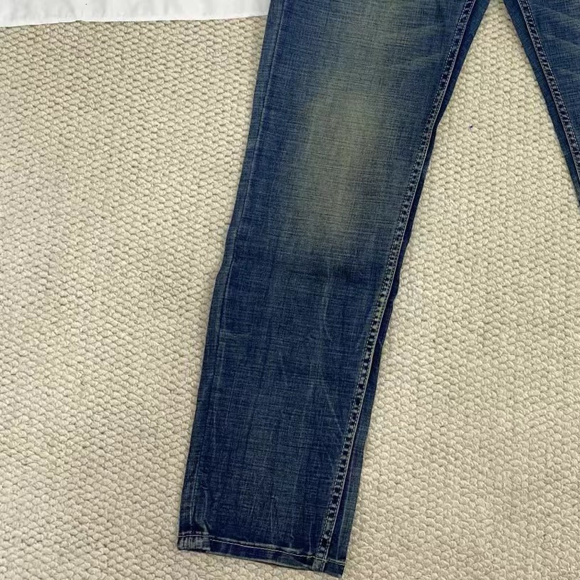 Vintage-Style Distressed Jeans - Image 6